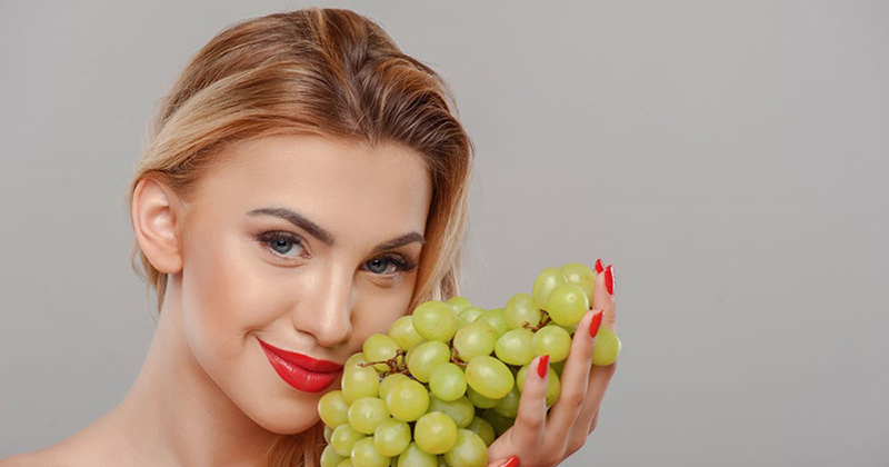 Grapes contain high levels of Vitamin E, contributing to skin brightening and smoothness.