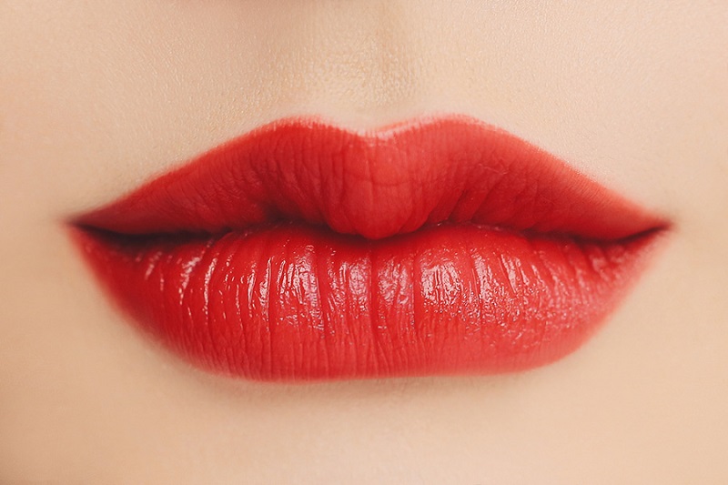 Orange-red is the present trendy lip color.