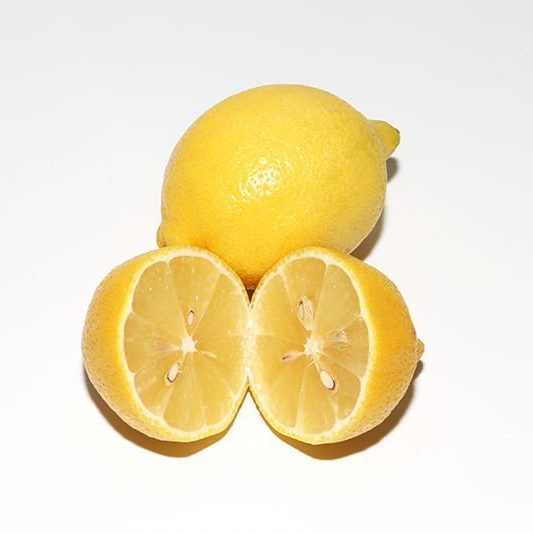 Gently exfoliate your hands and feet with lemon.