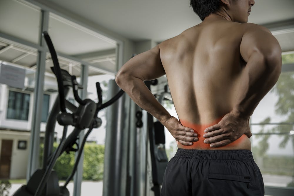 Muscle tension around the spine can contribute to low back pain.